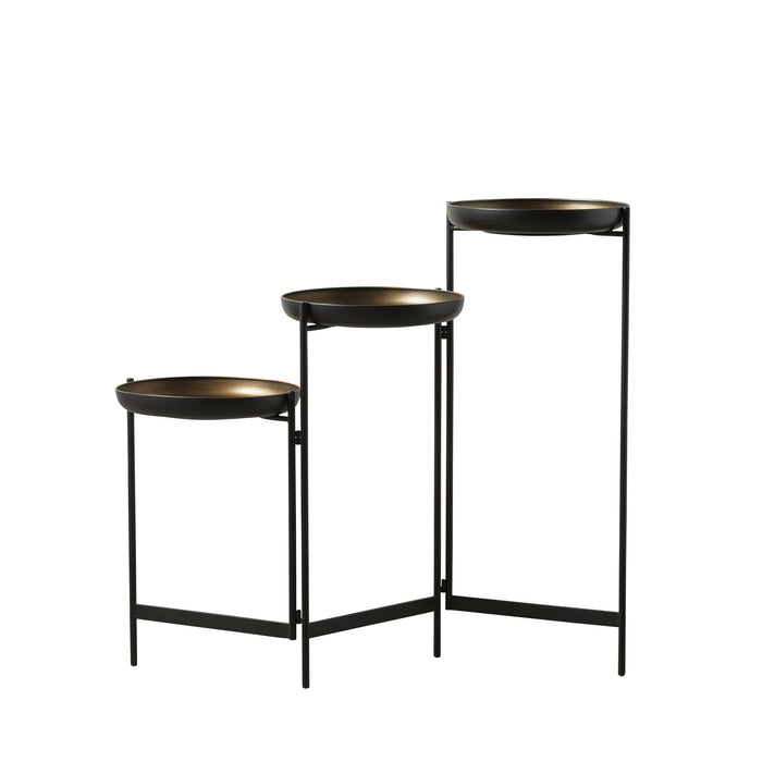 The Gracie Tiered Side Table 34x31x80cm features three round nesting tables in durable metal with black frames and bronze-colored tops, elegantly arranged at varying heights.