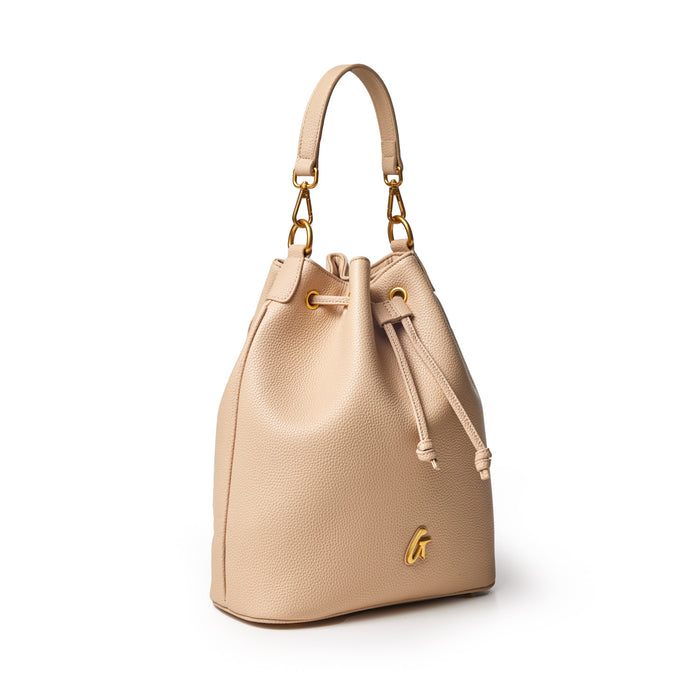 Large pebble bucket bag in nude with gold hardware, adjustable drawstring closure, and a top handle.