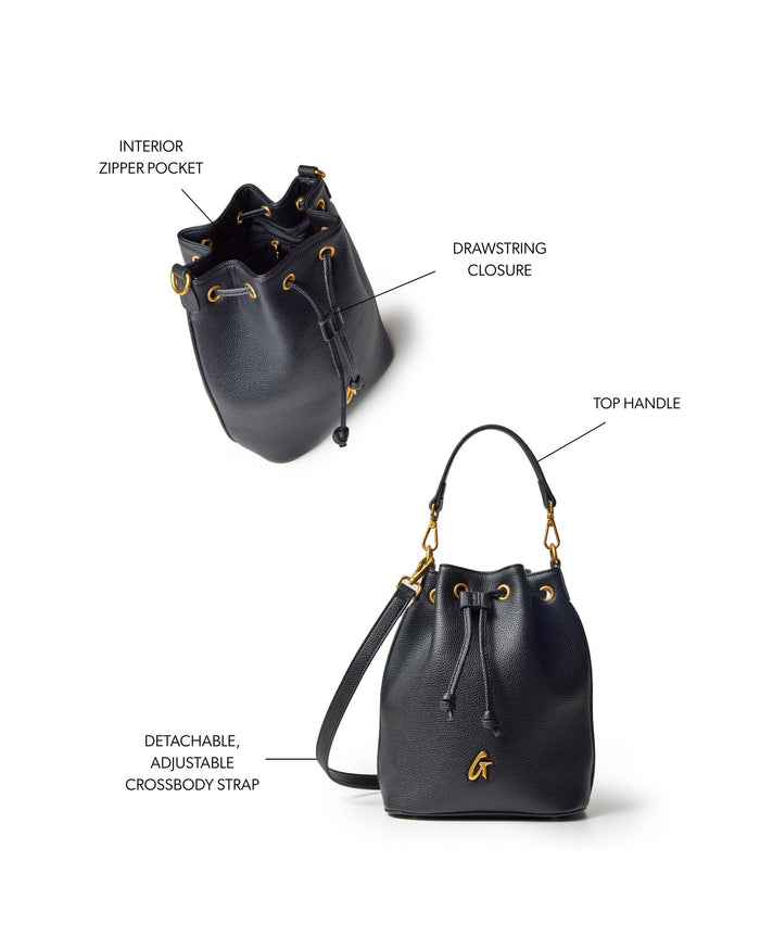 Medium black pebble bucket bag featuring a drawstring closure, top handle, and detachable adjustable crossbody strap.