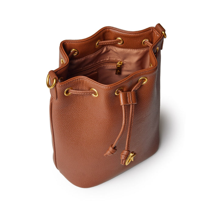 Medium brown pebble-textured bucket bag with gold-tone eyelets, drawstring closure, and interior zip pocket.