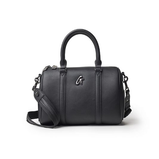 Medium black Boston bag featuring dual handles and a detachable shoulder strap, perfect for stylish everyday use.