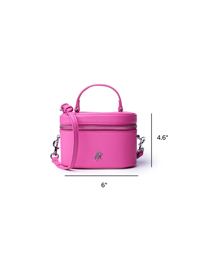 Hot pink mini smooth silver vanity bag with a handle and adjustable strap, perfect for stylish organization.