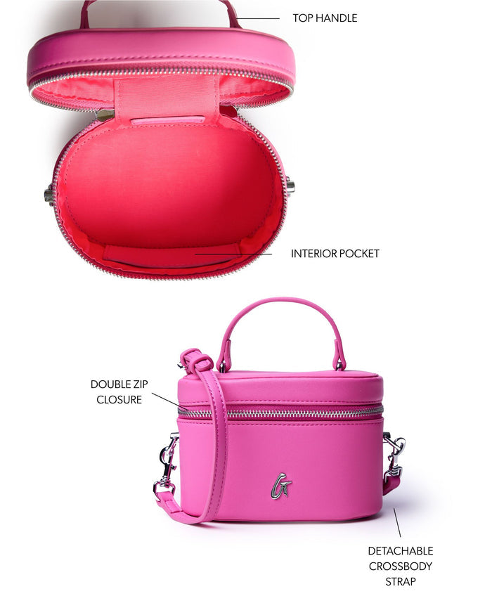 Hot pink mini smooth silver vanity bag with double zip closure, top handle, and detachable crossbody strap.