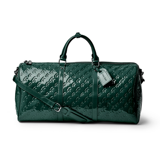 Monogram duffle bag in mirror green with a glossy finish, featuring dual handles and a detachable shoulder strap.