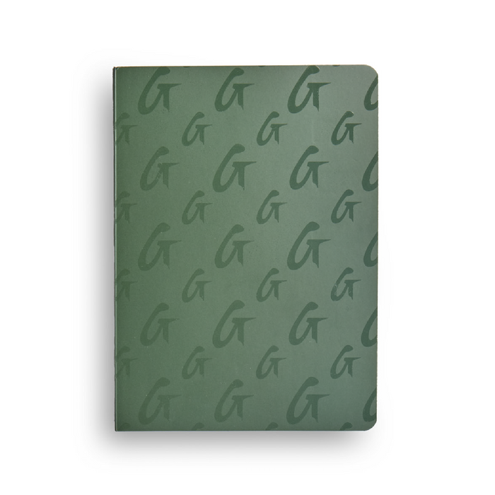 Green monogram notebook featuring a stylish pattern of the letter G, ideal for notes and journaling.