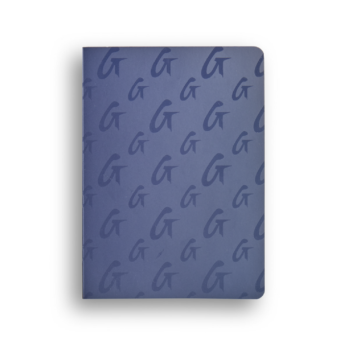 Navy monogram notebook featuring a repeating G logo pattern, perfect for stylish note-taking and organization.
